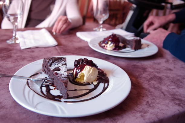 istock Chocolate cake with ice cream and fruits 1497078177