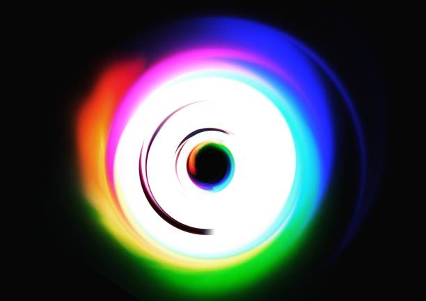 istock Abstract colorful light swirl and black background 1497080283