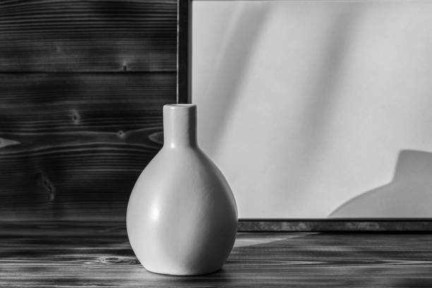 Spa still life of orchid flower in vase, close-up