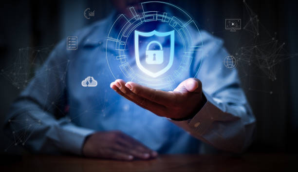 istock Cyber security and data protection. Businessman holding padlock protecting business and financial data with virtual network connection. Innovation technology develop smart solution from digital attack 1497084620