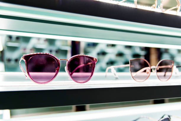 istock Sunglasses on shelves in a store 1497085727