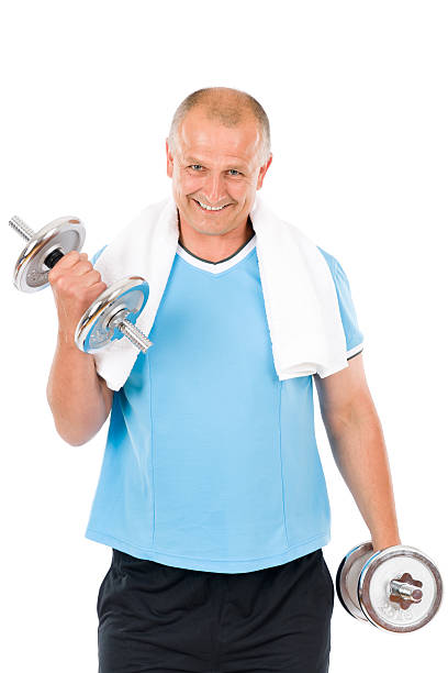 istock Happy mature man working out with dumbbells 149708597
