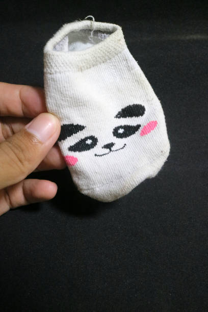 istock Cute baby socks with panda faces 1497085999