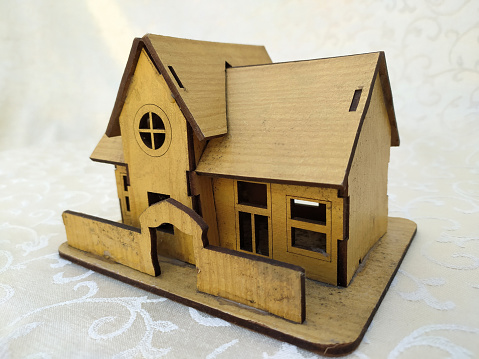 A photo of Miniature old house made of wood