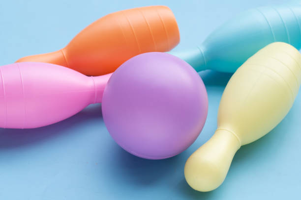 istock Colorful plastic bowling toy on blue background. 1497087537