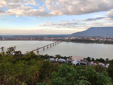 Panoramic view of the Mekong river and Lao-Nippon bridge viewed at Wat Phousalao (Golden Buddha temple), in Pakse, the capital and most populous city of province of Champasak, and the second most populous city in Laos.