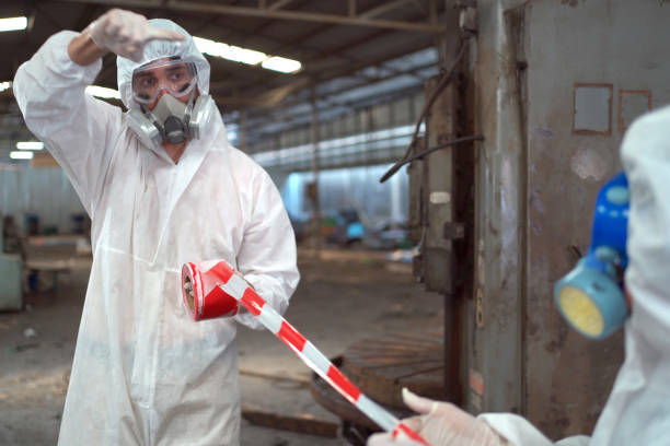 istock Chemists working in dangerous area. 1497091620