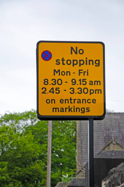 istock No stopping sign and times 1497094328