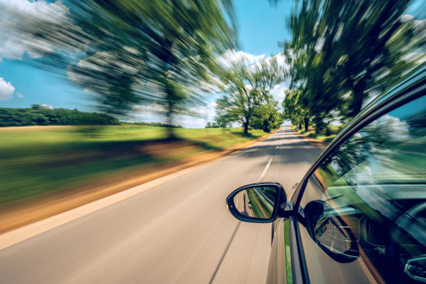 istock A car is driving on the highway, the environment is blurred 1497102243