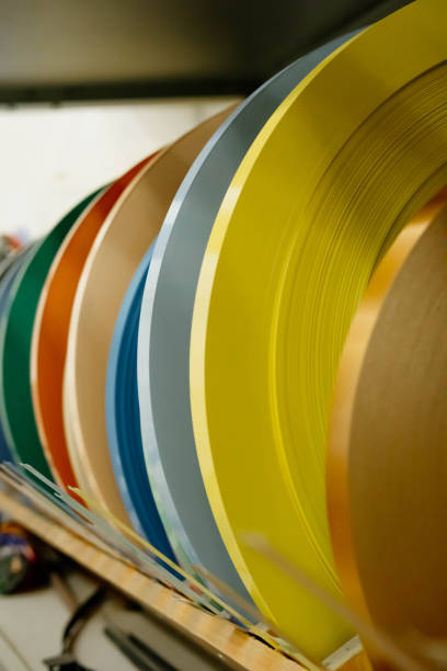 istock Samples of blinds for windows in the store. Plastic blinds, pleated, roll-up and day-night curtains in store 1497110681