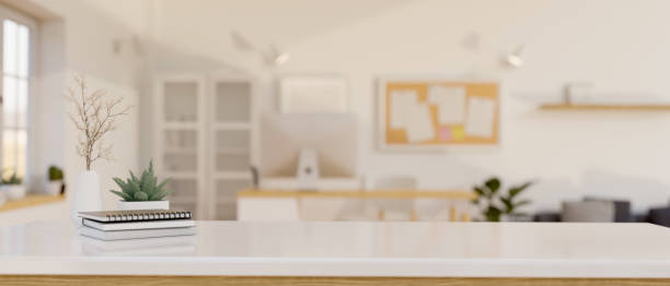 istock Close-up image of a white tabletop with copy spaced in a modern, minimal white office. 1497110763