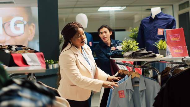 istock Employee calms customers on black friday 1497111426