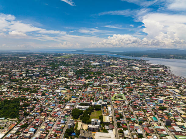 istock Flight over the city of Davao, Philippines. 1497113233