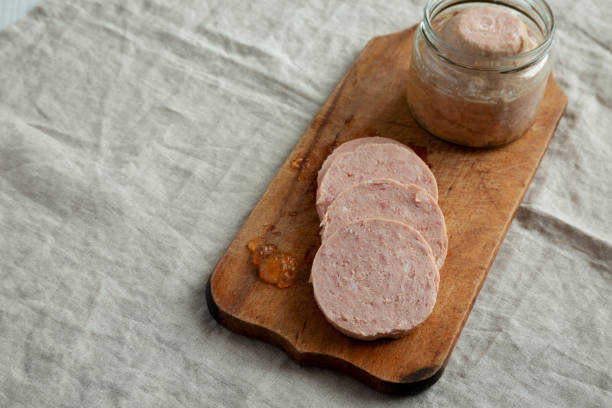 istock Homemade Jagdwurst on a rustic wooden board, side view. Space for text. 1497113367