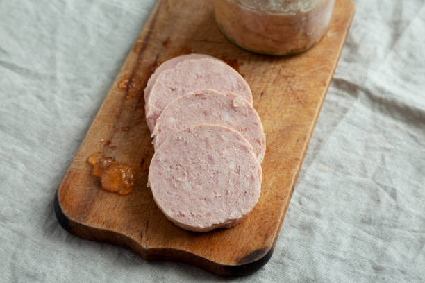 istock Homemade Jagdwurst on a rustic wooden board, side view. 1497113548