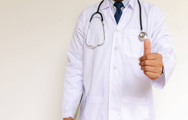 istock Doctor in lab coat on white background 1497114081