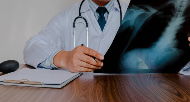 istock Doctor in lab coat on white background 1497114119