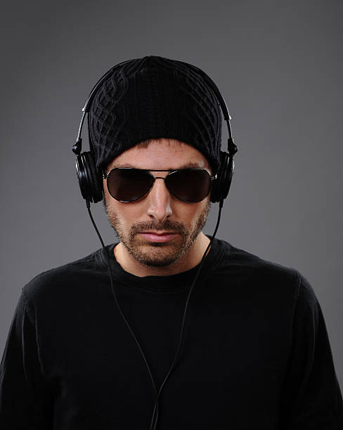 istock Serious DJ with headphones 149711445