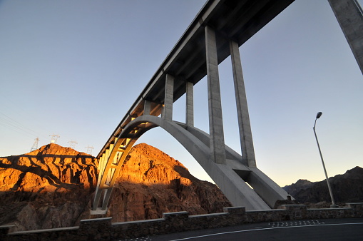 Arizona, USA- October 11, 2011: Hoover Dam is a concrete arch-gravity dam in the Black Canyon of the Colorado River, on the border between the U.S. states of Nevada and Arizona. Here is the Mike O’Callaghan-Pat Tillman Memorial bridge over the Hoovder Dam, it is also the world’s highest concrete arch bridge.
