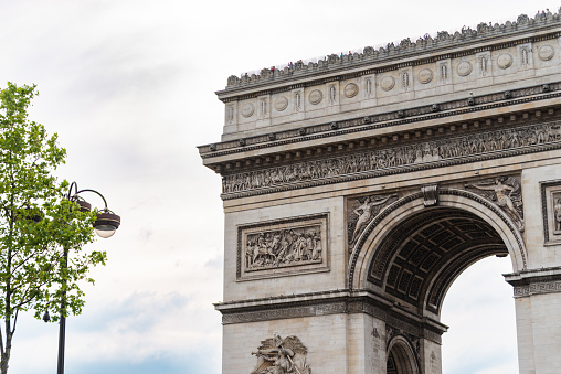 Detail of the Arc de Triomphe - La bataille d'Aboukir (The Battle of Aboukir), by Bernard Seurre. The Arc de Triomphe is one of the most famous monuments in Paris, France, standing at the western end of the Champs-Élysées at the centre of Place Charles de Gaulle. The location of the arc is shared between three arrondissements: 16th, 17th and 8th. The Arc de Triomphe honours those who fought and died for France in the French Revolutionary and Napoleonic Wars, with the names of all French victories and generals inscribed on its inner and outer surfaces.