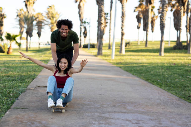 istock Boyfriend and girlfriend with skateboard. 1497125128