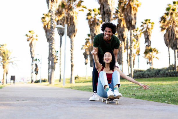 istock Boyfriend and girlfriend with skateboard. 1497125170