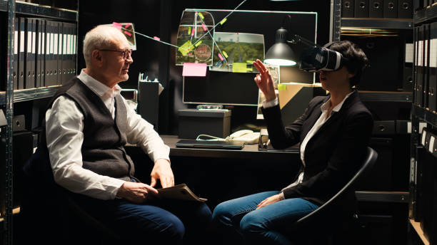 Law officer with vr glasses Law officer with vr glasses trying to recreate suspects actions and retrace his steps, conducting criminal investigation. Virtual reality headset used as tool to piece clues together. Tripod shot. tripod attack stock pictures, royalty-free photos & images