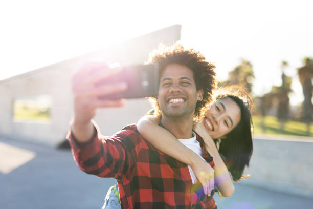 istock Loving couple taking selfie photo 1497126055