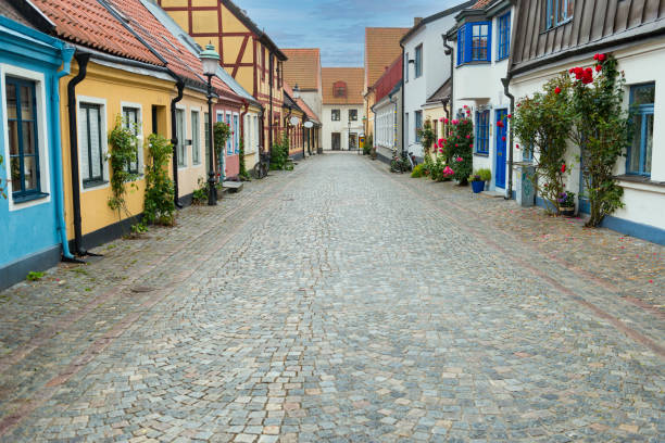 istock Cobblestone street in Ystad Sweden 1497127853