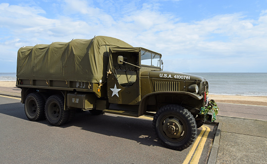 Felixstowe, Suffolk, England - May 05, 2019: Vintage WW2 American Army Truck Parked on Seafront Promenade.