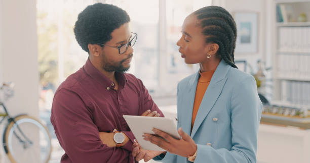 istock Planning, advice and black people with tablet for internet proposal, project discussion and website. Collaboration, connection and employees with digital technology for online strategy 1497133628
