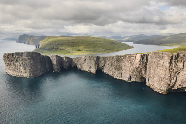 istock Faroe islands dramatic coastline in Vagar. Leitisvatn lake 1497134944