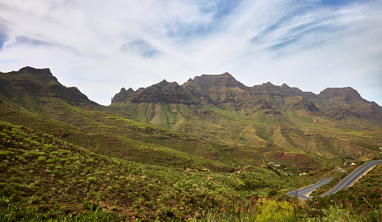 Nature and landscape with volcanic formation mountains in Gran Canaria island. View from the panoramic road, on the mountain ranges of the island of Gran Canaria. View of the mountain range of the Reserva Natural Especial de Güigüí.
