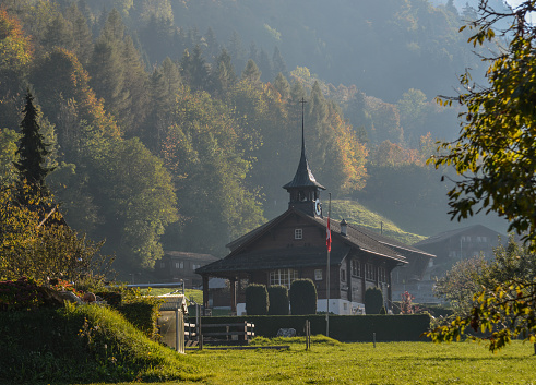 Interlaken, Switzerland - Oct 21, 2018. Old wooden church on mountain in Interlaken, Switzerland.
