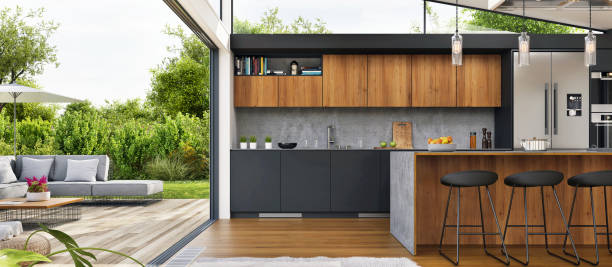 Modern kitchen with an open terrace stock photo