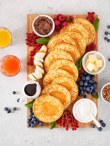 istock american pancake board with bacon berries maple syrup butter 1497142584
