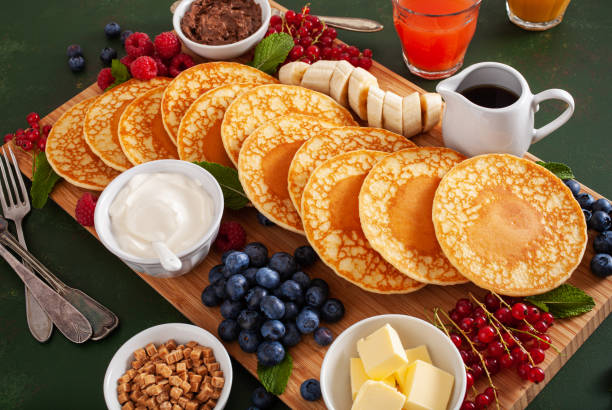 istock american pancake board with bacon berries maple syrup butter 1497142589