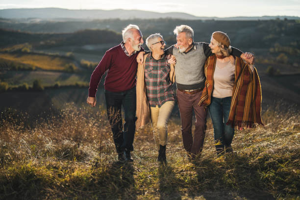 istock Happy embraced seniors having fun on a hill in autumn day. 1497145227