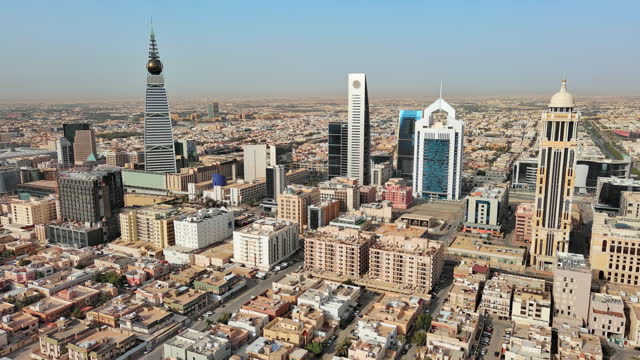 Riyadh: Aerial view of capital city of Saudi Arabia, modern city skyline, Al Olaya financial district with skyscrapers - landscape panorama of Arabian Peninsula from above