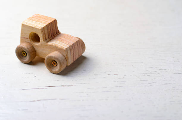 istock Wooden Car Handmade Toy on White Background 1497148474