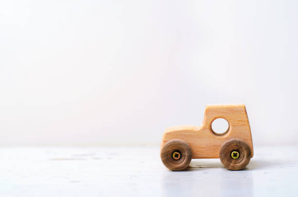 istock Wooden Car Handmade Toy on White Background 1497148500