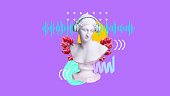 Music vibe. Antique statue bust in headphones against purple background with abstract elements. Dj. Contemporary art collage.