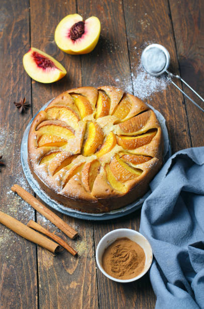 istock Peach Pie over Wooden Background, Homemade Bakery 1497152126