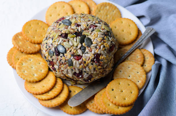 istock Vegan Cheeseball Appetizer Served with Crackers, Hummus, Nut Butter Spread 1497152841