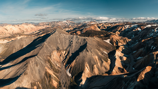 Landmannalaugar is known for its texturized colored mountains and attracts many hikers in the summer season when Highlands are accessible.