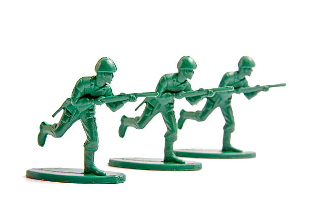 istock Three toy soldiers on a white background 149716143