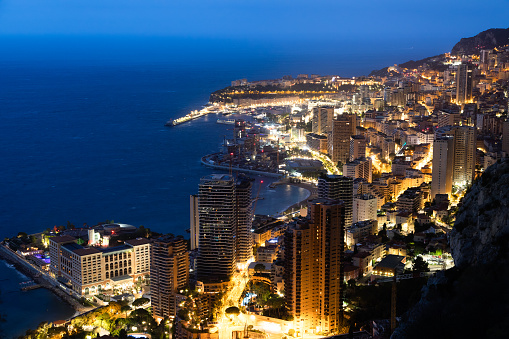 Monte Carlo panorama illuminated by night. Urban landscape with luxury architecture