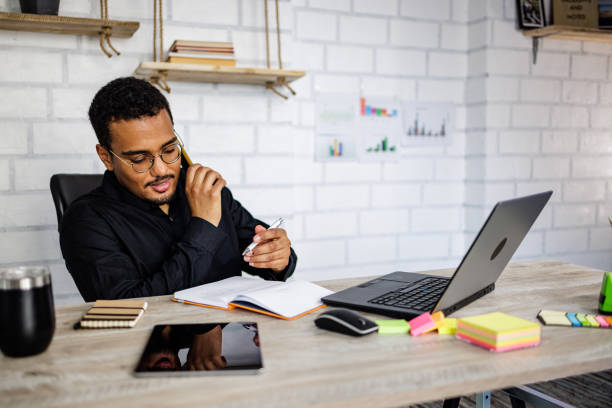 istock Man receives orders for his small business 1497164176
