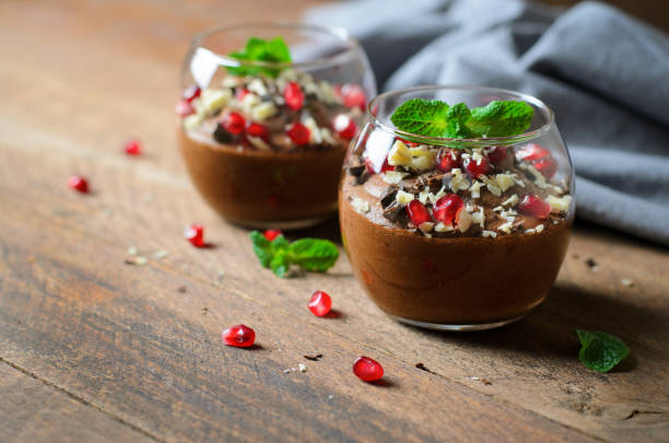 istock Chocolate Mousse Served with Pomegranate Seeds and Mint, Delicious Dessert 1497164521