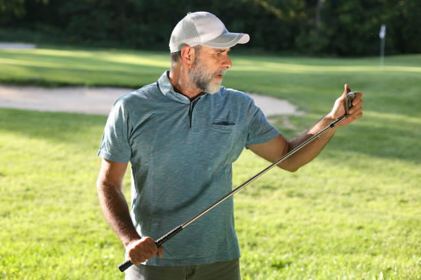 istock Examining a golf club 1497174981